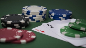 Popularity of Online Blackjack in CA Casino chips with two Aces on casino table