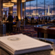 Editorial illustration of Nevada casino regulation, a gaming salon floor, and official rule documents